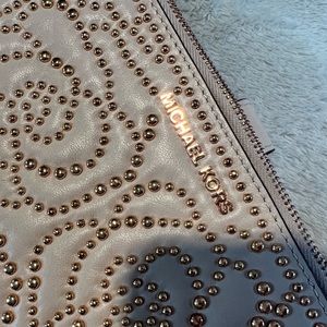 MK rose gold wristlet